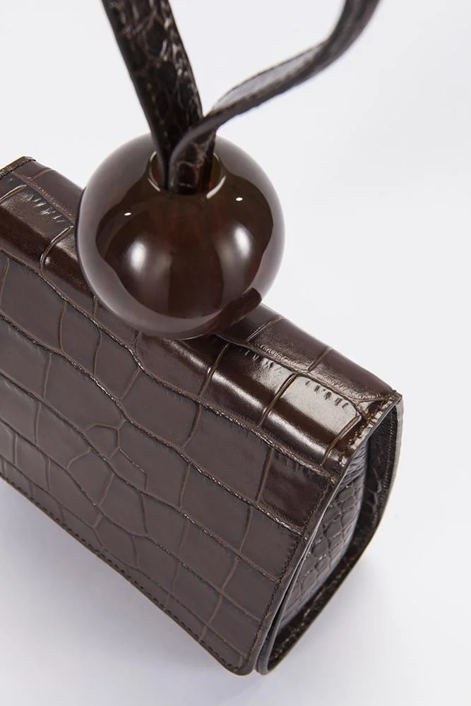 IMWIM - Home to the world's most-coveted designer apparel, bags